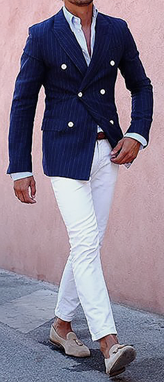 Picture of Double-breasted navy jacket with cream trousers