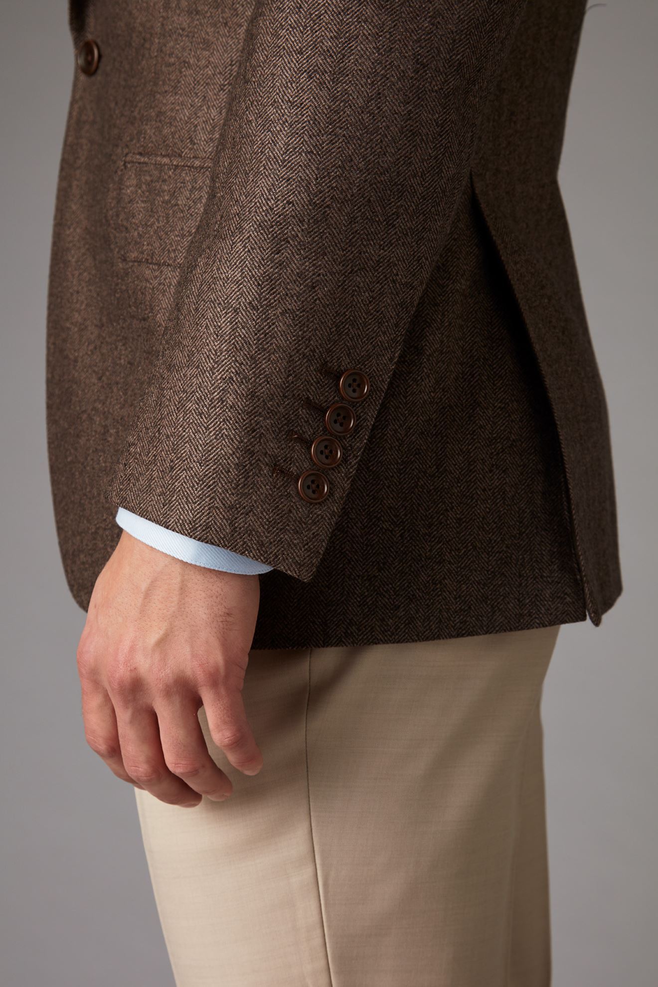 Brown tweed jacket detail